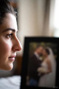 “Woman reflecting on her relationship while considering family mediation”